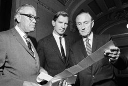 The Senate passed the controversial crime control bill for D.C. over protests by opponents that parts of it trample on Constitutional rights, July 23, 1970, in Washington. From left: Sen. Roman L. Hruska (R-Neb.), Sen. Joseph D. Tydings (D-Md.) and Sen. Mike Mansfield (D-Mont.), checking the voting results. (AP Photo)