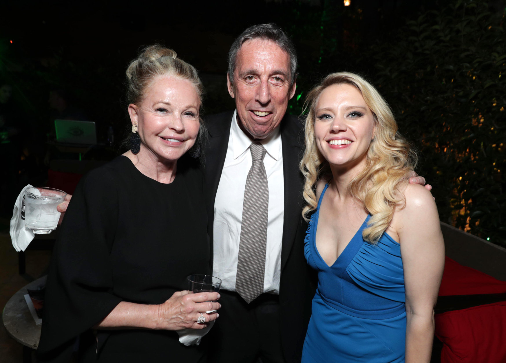 Genevieve Robert, Ivan Reitman, and Kate McKinnon are seen at the Los Angeles Premiere of Columbia Pictures' Ghostbusters at TCL Chinese Theatre on Saturday, July 9, 2016, in Los Angeles. (Photo by Eric Charbonneau/Invision for Sony/AP Images)