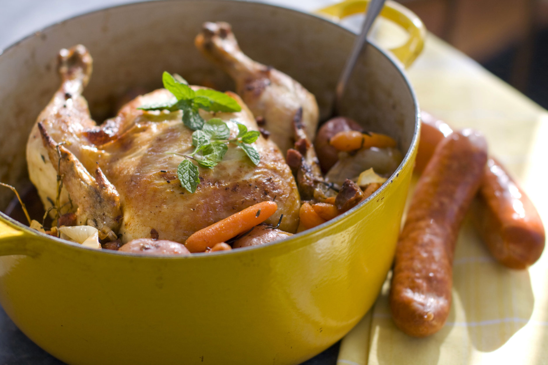 In this image taken on Jan. 24, 2012, a roasted chicken with chorizo and root vegetables is shown in Concord, N.H. (AP Photo/Matthew Mead)