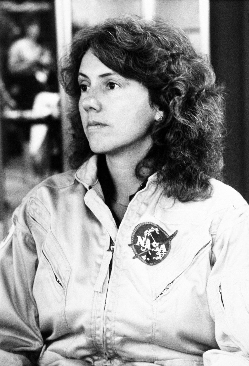 Close up of suited Christa McAuliffe during briefing in 1985. (AP Photo)