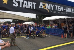 The wounded warriors getting ready to get the Army 10 miler going.  They started off at 7:50 a.m.  At 8 a.m. the runners took off from the Pentagon to DC and back. (WTOP/John Domen)
