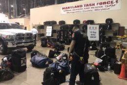 Sixteen search-and-rescue technicians with MD-TF1 were deployed from a staging warehouse in Montgomery County early Tuesday. (WTOP/Melissa Howell)
