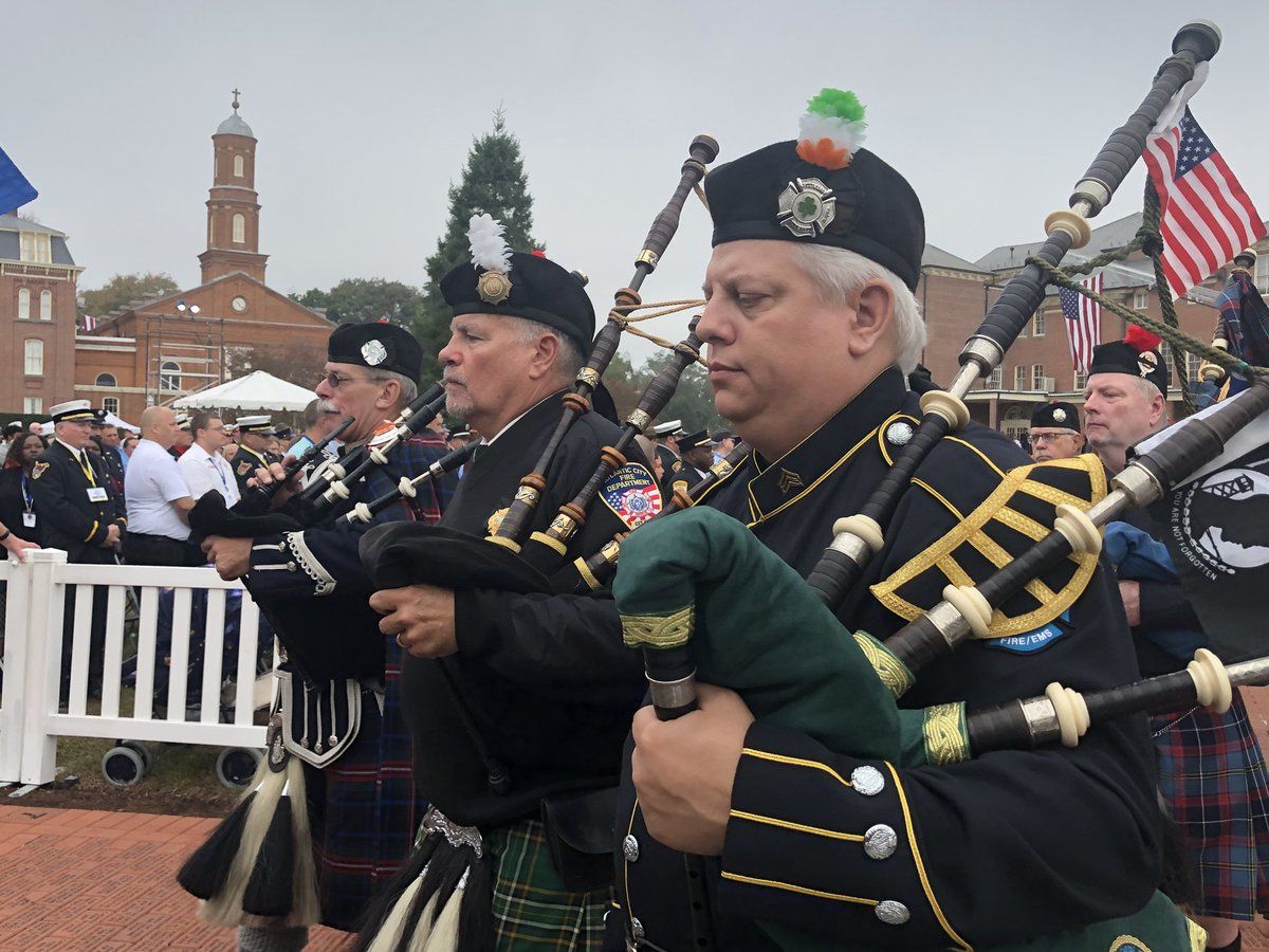 Bagpipe leaders join a procession in honor of fallen firefighters across the nation. (WTOP/Melissa Howell)