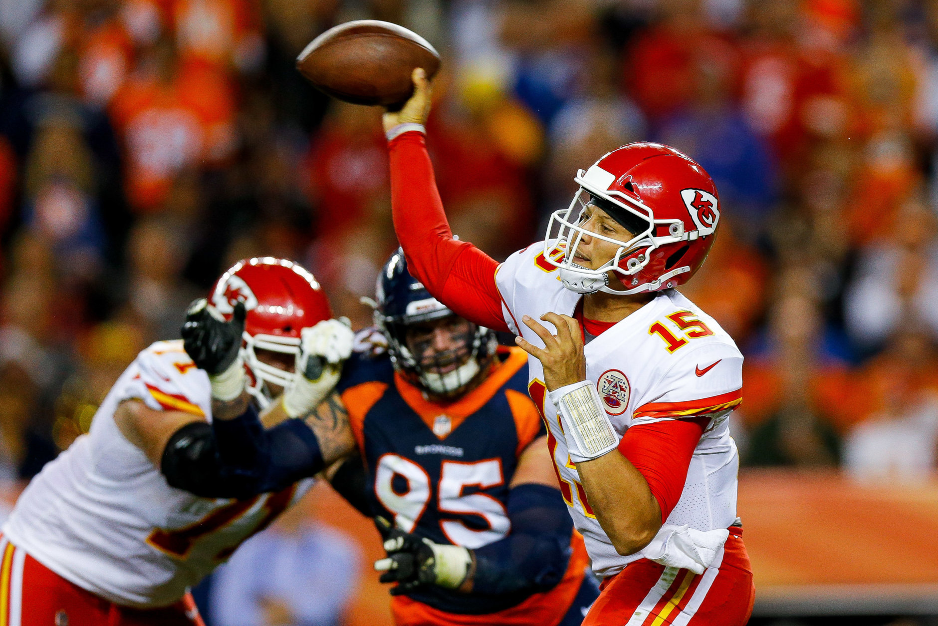 DENVER, CO - OCTOBER 1:  Quarterback Patrick Mahomes #15 of the Kansas City Chiefs passes against the Denver Broncos in the second quarter of a game at Broncos Stadium at Mile High on October 1, 2018 in Denver, Colorado. (Photo by Justin Edmonds/Getty Images)