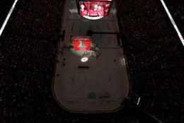 WASHINGTON, DC - OCTOBER 03: The Washington Capitals watch their 2018 Stanley Cup Championship banner rise to the rafters before playing against the Boston Bruins at Capital One Arena on October 3, 2018 in Washington, DC. (Photo by Patrick Smith/Getty Images)