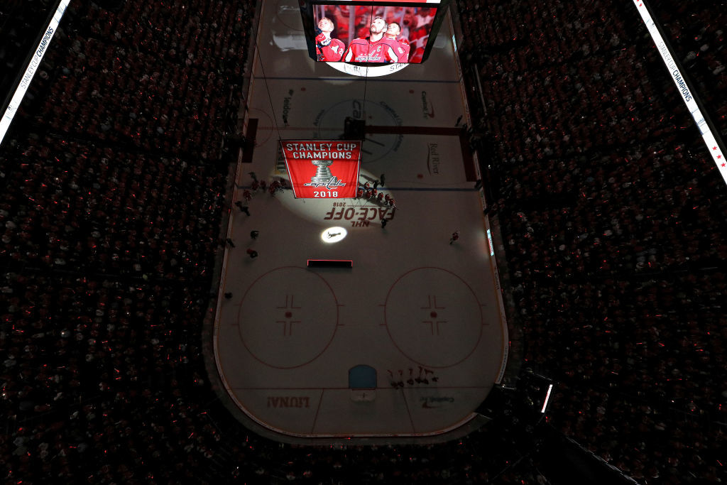 WASHINGTON, DC - OCTOBER 03: The Washington Capitals watch their 2018 Stanley Cup Championship banner rise to the rafters before playing against the Boston Bruins at Capital One Arena on October 3, 2018 in Washington, DC. (Photo by Patrick Smith/Getty Images)