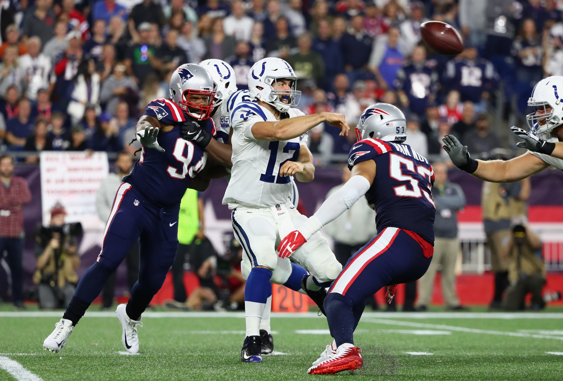 FOXBOROUGH, MA - OCTOBER 04:  Andrew Luck #12 of the Indianapolis Colts throws a pass during the second half against the New England Patriots at Gillette Stadium on October 4, 2018 in Foxborough, Massachusetts.  (Photo by Adam Glanzman/Getty Images)