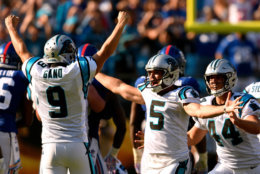 CHARLOTTE, NC - OCTOBER 07:  Kicker Graham Gano #9 celebrates with Michael Palardy #5 and J.J. Jansen #44 of the Carolina Panthers after his game-wining 63-yard field goal against the New York Giants during their game at Bank of America Stadium on October 7, 2018 in Charlotte, North Carolina. The Panthers won 33-31.  (Photo by Grant Halverson/Getty Images)
