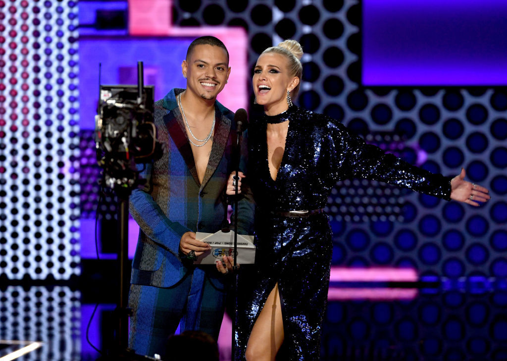 LOS ANGELES, CA - OCTOBER 09:  Evan Ross (L) and Ashlee Simpson speak onstage during the 2018 American Music Awards at Microsoft Theater on October 9, 2018 in Los Angeles, California.  (Photo by Kevin Winter/Getty Images For dcp)
