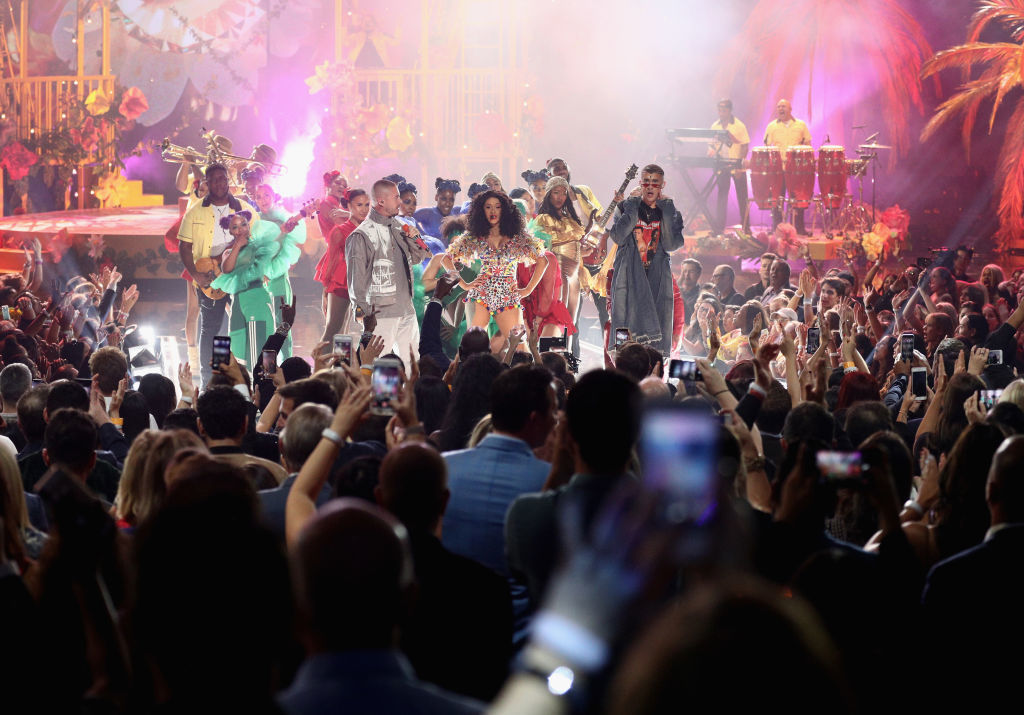 LOS ANGELES, CA - OCTOBER 09:  (L-R) J Balvin, Cardi B, and Bad Bunny perform onstage during the 2018 American Music Awards at Microsoft Theater on October 9, 2018 in Los Angeles, California.  (Photo by Frederick M. Brown/Getty Images)