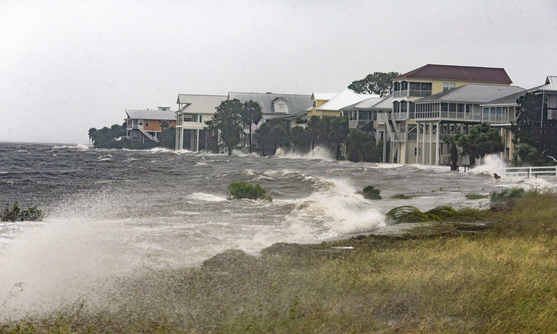SHELL POINT BEACH, FL - OCTOBER 10: The storm surge and waves from Hurricane Michael batter the beachfront homes on October 10, 2018 in the Florida Panhandle community of Shell Point Beach, Florida. The hurricane is forecast to hit the Florida Panhandle at a possible category 4 storm.  (Photo by Mark Wallheiser/Getty Images)