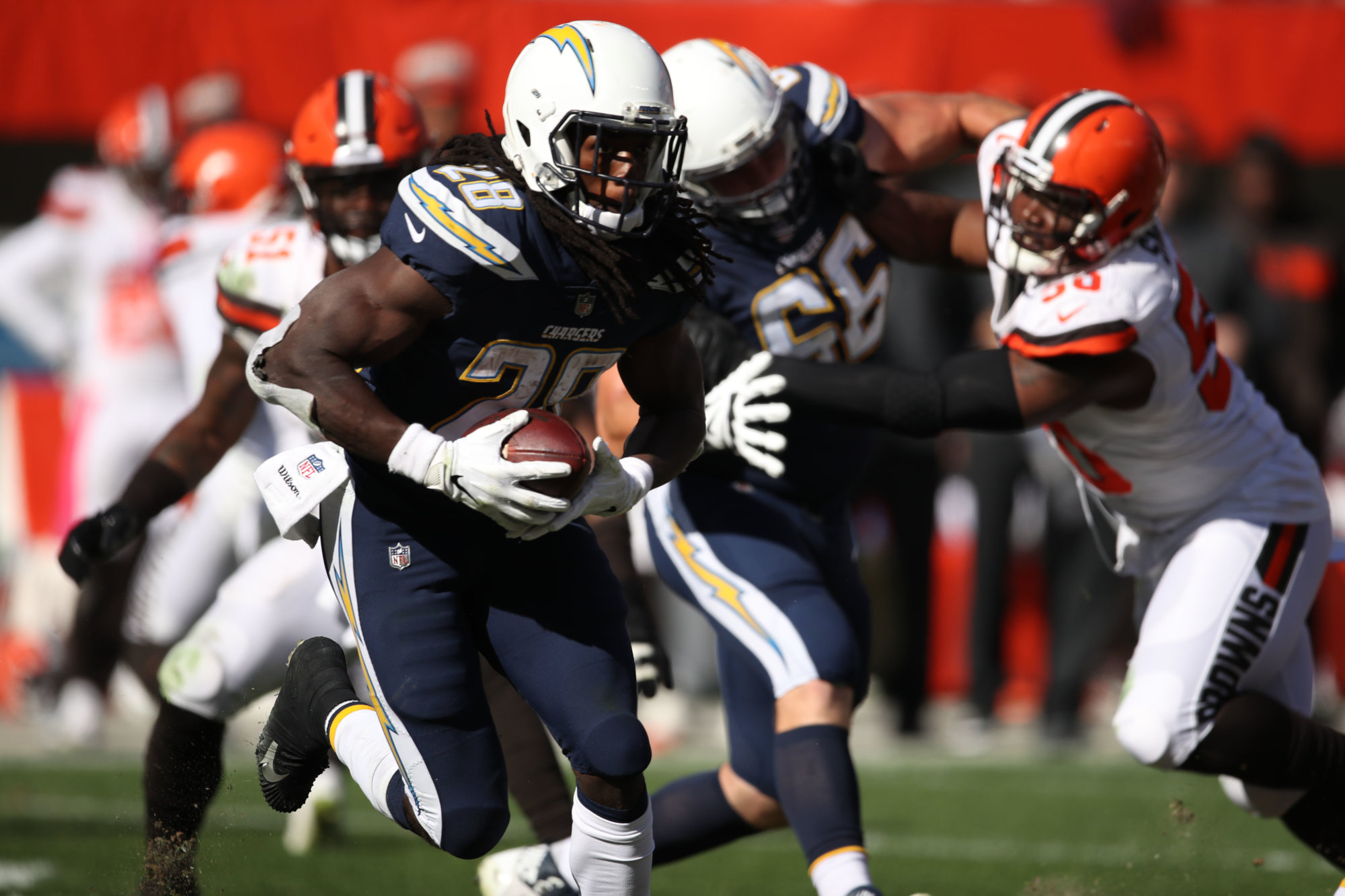 CLEVELAND, OH - OCTOBER 14: Melvin Gordon #28 of the Los Angeles Chargers runs the ball in the second half against the Cleveland Browns at FirstEnergy Stadium on October 14, 2018 in Cleveland, Ohio.  The Los Angeles Chargers won 38 to 14. (Photo by Gregory Shamus/Getty Images)