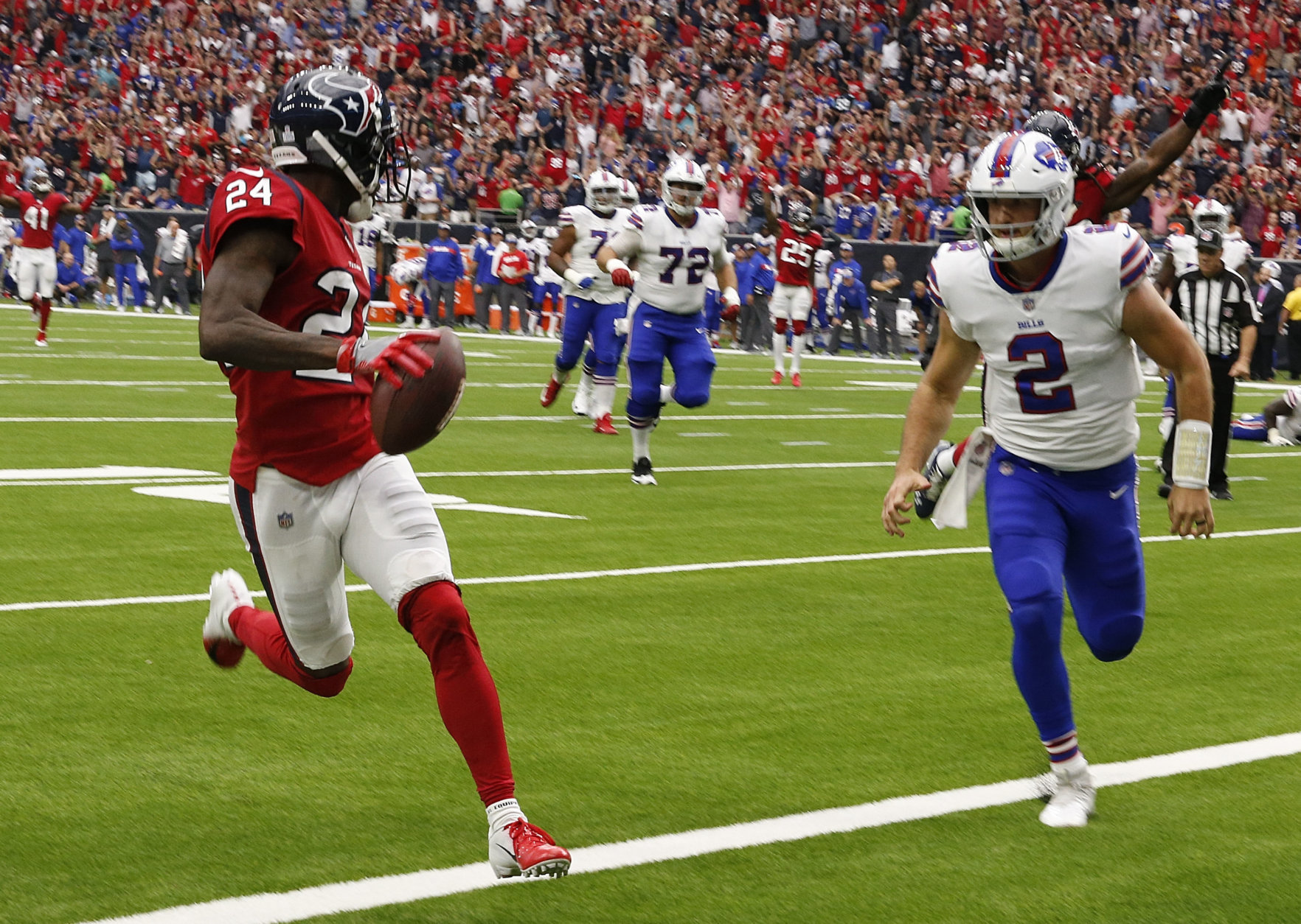 HOUSTON, TX - OCTOBER 14:  Johnathan Joseph #24 of the Houston Texans scores on an intereption as Nathan Peterman #2 of the Buffalo Bills is late on the coverage at NRG Stadium on October 14, 2018 in Houston, Texas.  (Photo by Bob Levey/Getty Images)