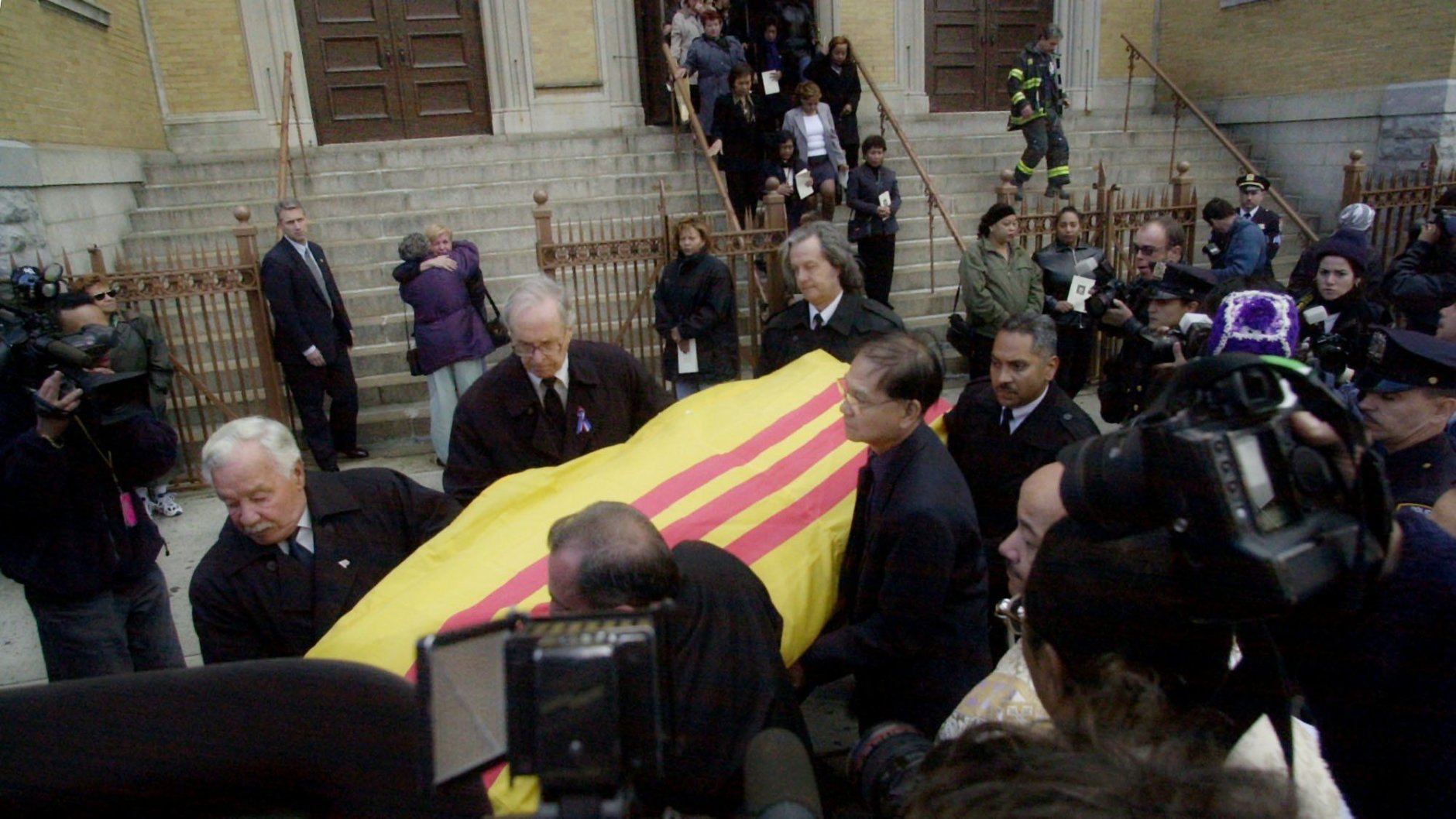 The casket containing the remains of Kathy T. Nguyen is taken from St. John Chrysostom Roman Catholic Church in the Bronx borough of New York, Monday, Nov. 5, 2001, after her funeral mass. Nguyen, an employee of the Manhattan Eye, Ear and Throat Hospital, died Wednesday of the inhaled form of anthrax. (AP Photo/Ed Betz)
