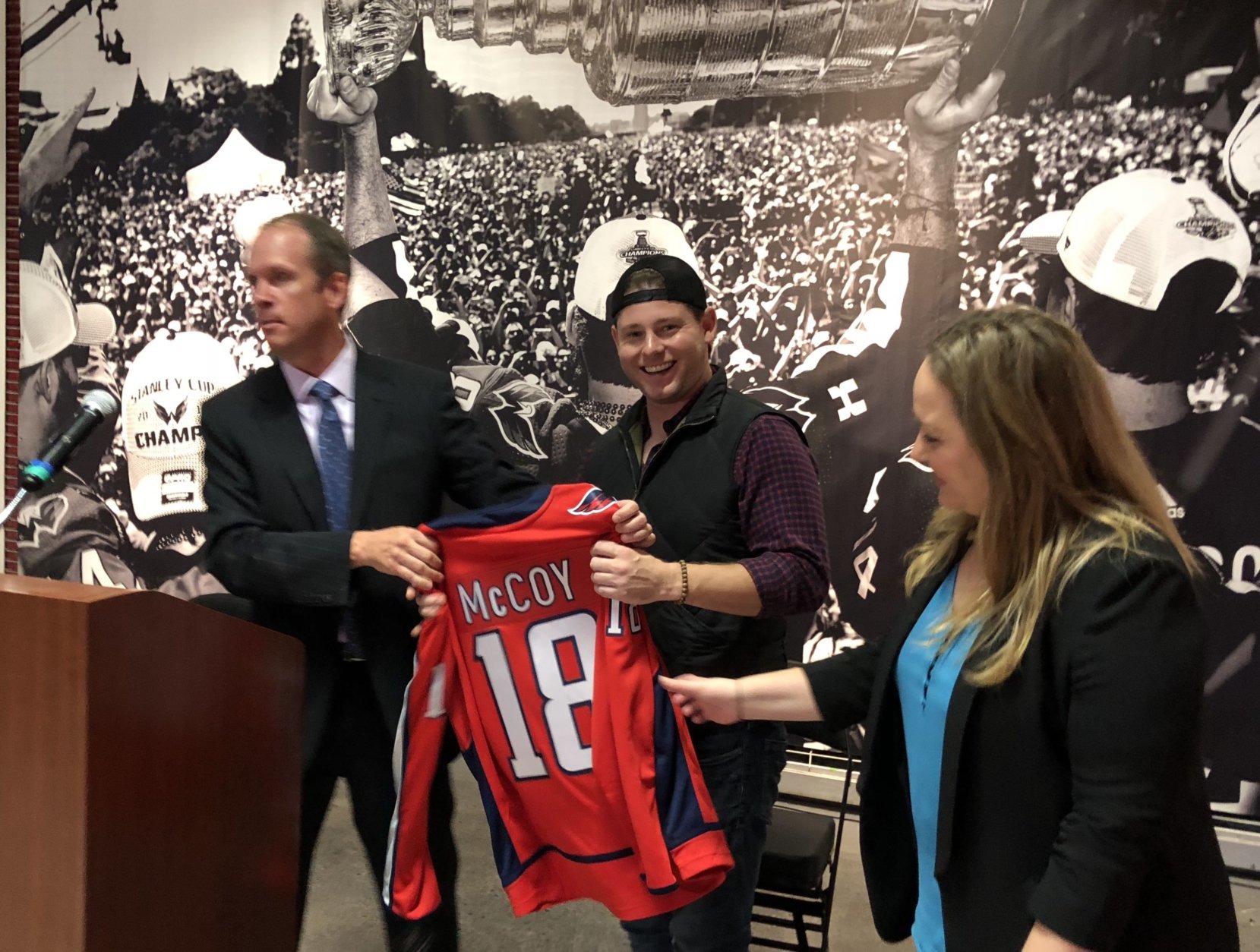 "I'm a D.C. boy, born and raised," Lucky Buns owner and chef, Alex McCoy said. "I've had a lot of really good times here in this arena." Pictured with President of Venues for Monumental Sports & Entertainment, David Touhey and Aramark's Liz Noe at the unveiling of Capital One Arena’s renovated venue, food and drink experience. (WTOP/Kristi King)