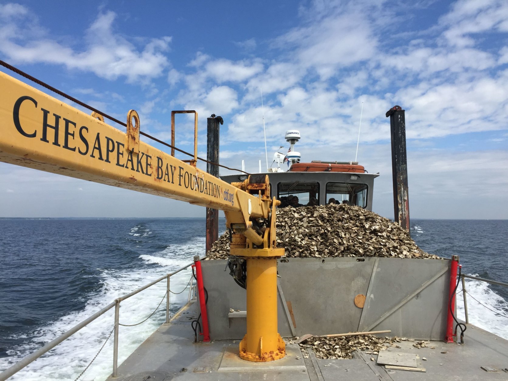 The Chesapeake Bay Foundation’s oyster-planting vessel The Patricia Campbell plants 4 million oysters in the Little Choptank River Sanctuary on Maryland’s Eastern Shore in this 2016 photo. (Courtesy, Chesapeake Bay Foundation/Emmy Nicklin)