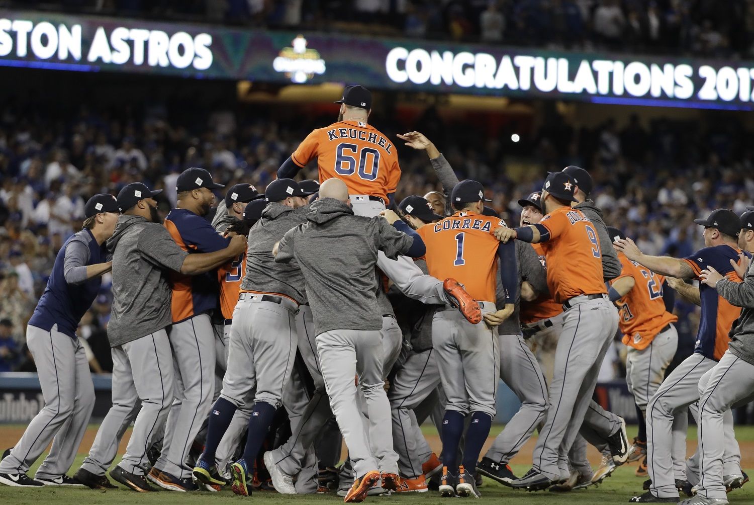 The Houston Astros celebrate after Game 7 of baseball's World Series against the Los Angeles Dodgers Wednesday, Nov. 1, 2017, in Los Angeles. The Astros won 5-1 to win the series 4-3. (AP Photo/David J. Phillip)