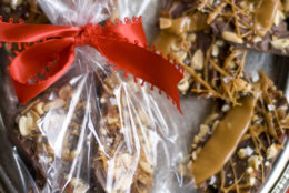 This Oct. 26, 2011 photo shows caramel bacon peanut bark in Concord, N.H. This bark can be broken into chunks and packaged in plastic bags or candy boxes for gifts.     (AP Photo/Matthew Mead)