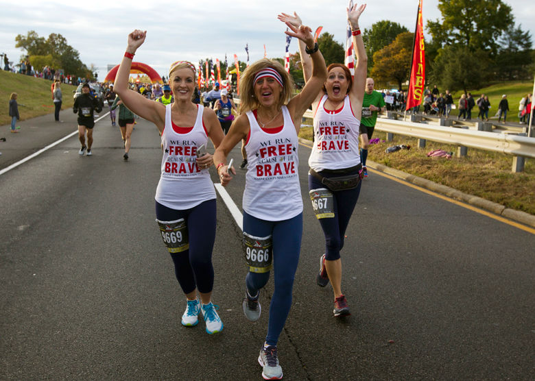 Runners start the Marine Corps Marathon on Sunday in Arlington. (AP Photo/Jose Luis Magana)