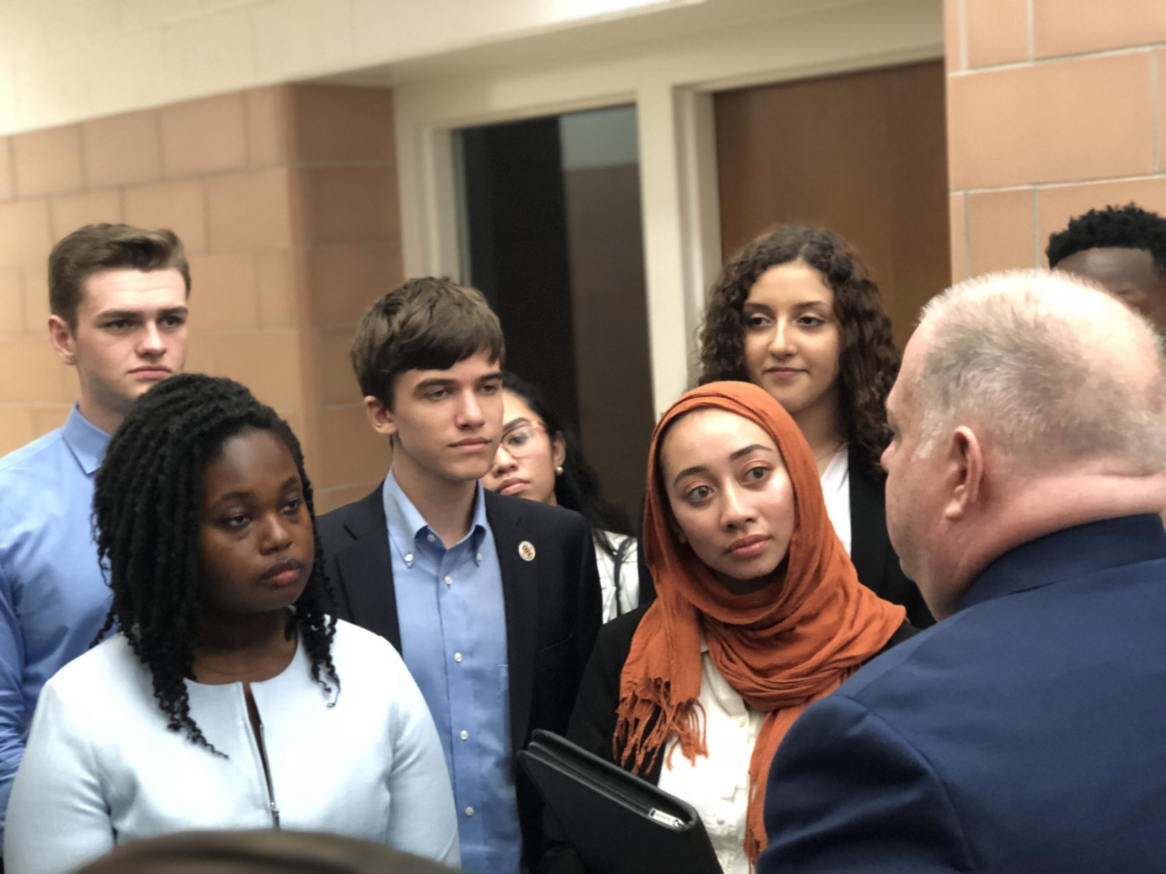 Maryland Gov. Larry Hogan spoke to students about the new school safety tip line. They got a tour of the Maryland Emergency Management Agency facility in Reisterstown, Maryland, on Wednesday, Oct. 3, 2018. (WTOP/Kate Ryan)