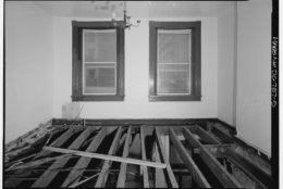 The second-floor front room of the Surratt House during a Historic American Buildings Survey circa 1972. (Courtesy Library of Congress)