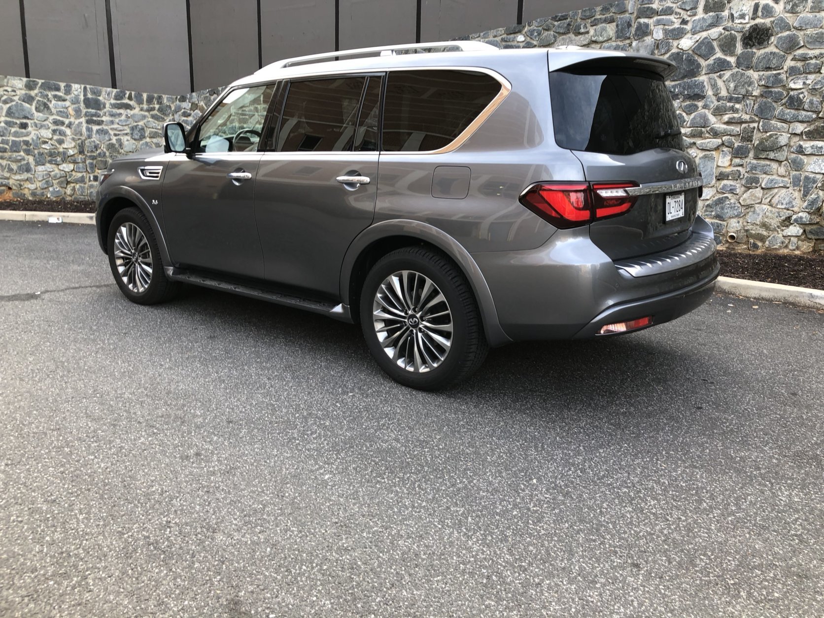 Thankfully, the tall QX80 comes with running boards to help entry and exit but power-folding running boards would be nice. (WTOP/Mike Parris)