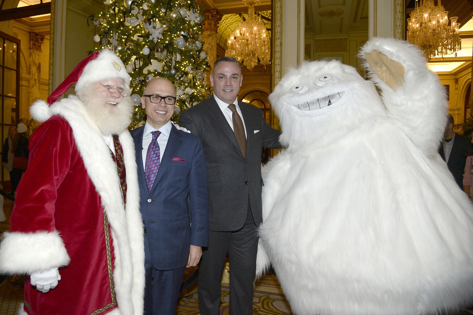 NEW YORK, NY - DECEMBER 02: Santa Claus, George Cozonis, John Cruz and Saks Yeti attend The Plaza 3rd Annual Holiday Tree Lighting at The Plaza Hotel on December 2, 2013 in New York City.  (Photo by Fernanda Calfat/Getty Images)