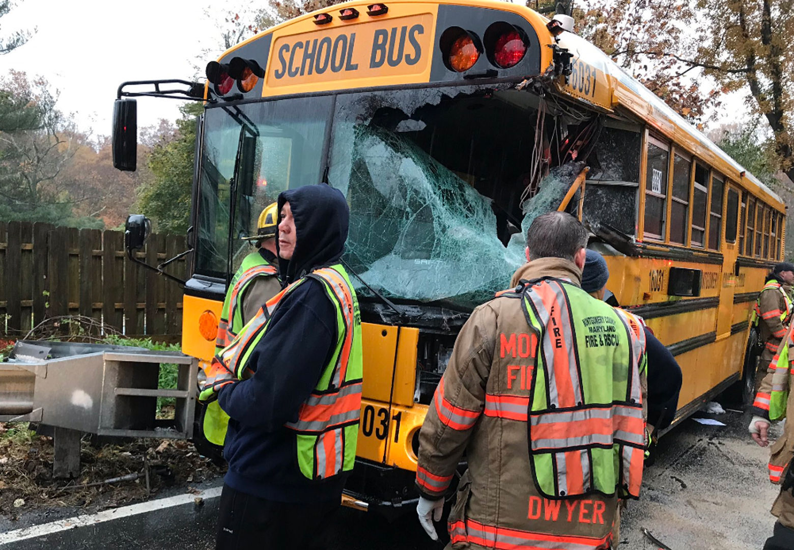 Officials respond to the scene where a bus collided with a trash truck Monday morning in Montgomery County. (Courtesy NBC4/Adam Tuss)
