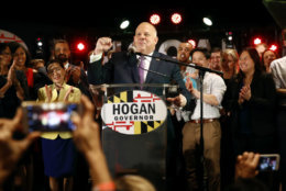 Maryland Gov. Larry Hogan, center, celebrates as he speaks at an election night party, Tuesday, Nov. 6, 2018, in Annapolis, Md. Hogan earned a second term after defeating Democratic opponent Ben Jealous. (AP Photo/Patrick Semansky)