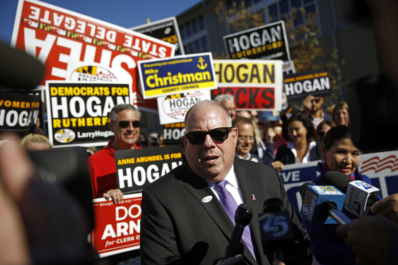 Maryland Gov. Larry Hogan speaks with the news media outside a polling place after voting early, Tuesday, Oct. 30, 2018, in Annapolis, Md. Hogan is running for re-election against Democratic candidate Ben Jealous. (AP Photo/Patrick Semansky)