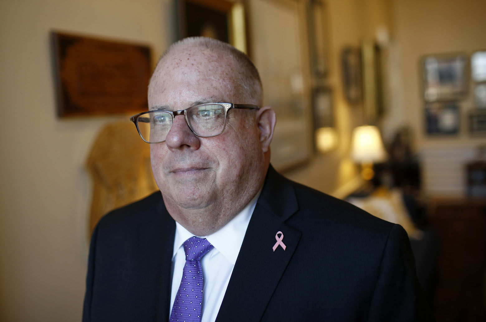 FILE - In this Oct. 25, 2018 file photo, Maryland Gov. Larry Hogan poses for a photograph after an interview with The Associated Press in his office at the Maryland State House in Annapolis, Md. Hogan is running for re-election against Democratic candidate Ben Jealous. (AP Photo/Patrick Semansky, File)
