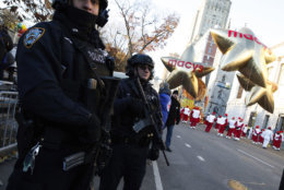 Members of the New York Police Department take a position along the route before the start of the 92nd annual Macy's Thanksgiving Day Parade in New York, Thursday, Nov. 22, 2018. (AP Photo/Eduardo Munoz Alvarez)
