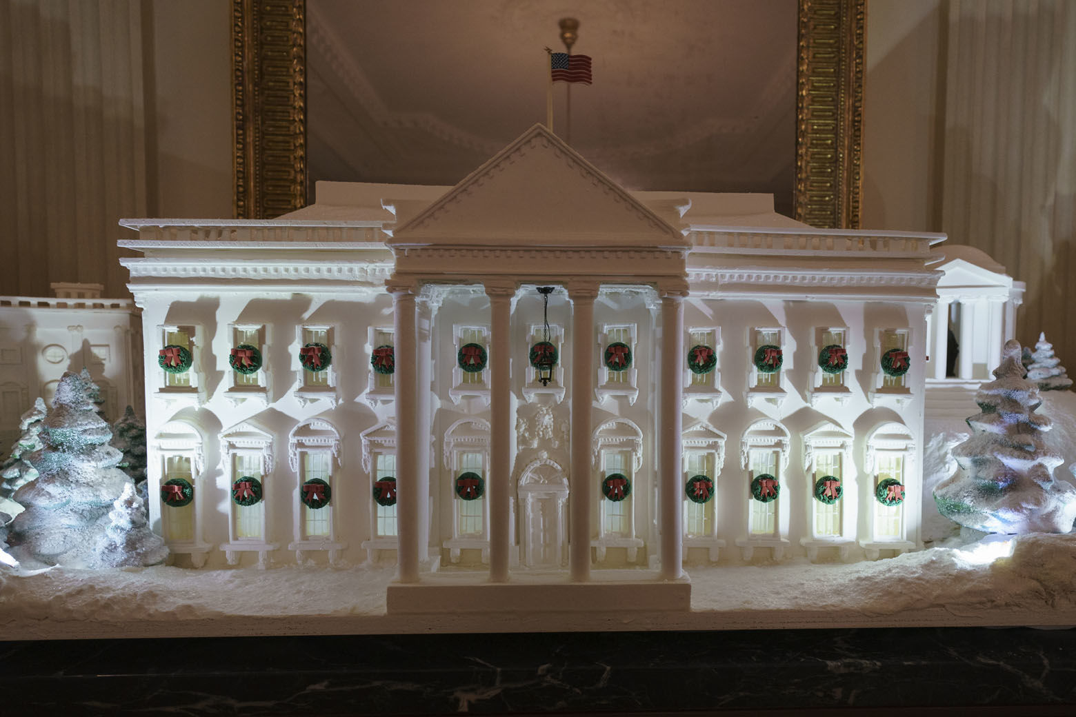 The gingerbread house, showcasing the full expanse of the National Mall: the Capitol, the Lincoln Memorial, the Jefferson Memorial, the Washington Monument, and, the White House is seen in the State Dining Room during the 2018 Christmas Press Preview at the White House in Washington, Monday, Nov. 26, 2018. Christmas has arrived at the White House. First lady Melania Trump unveiled the 2018 White House holiday decor on Monday. She designed the decor, which features a theme of "American Treasures." (AP Photo/Carolyn Kaster)