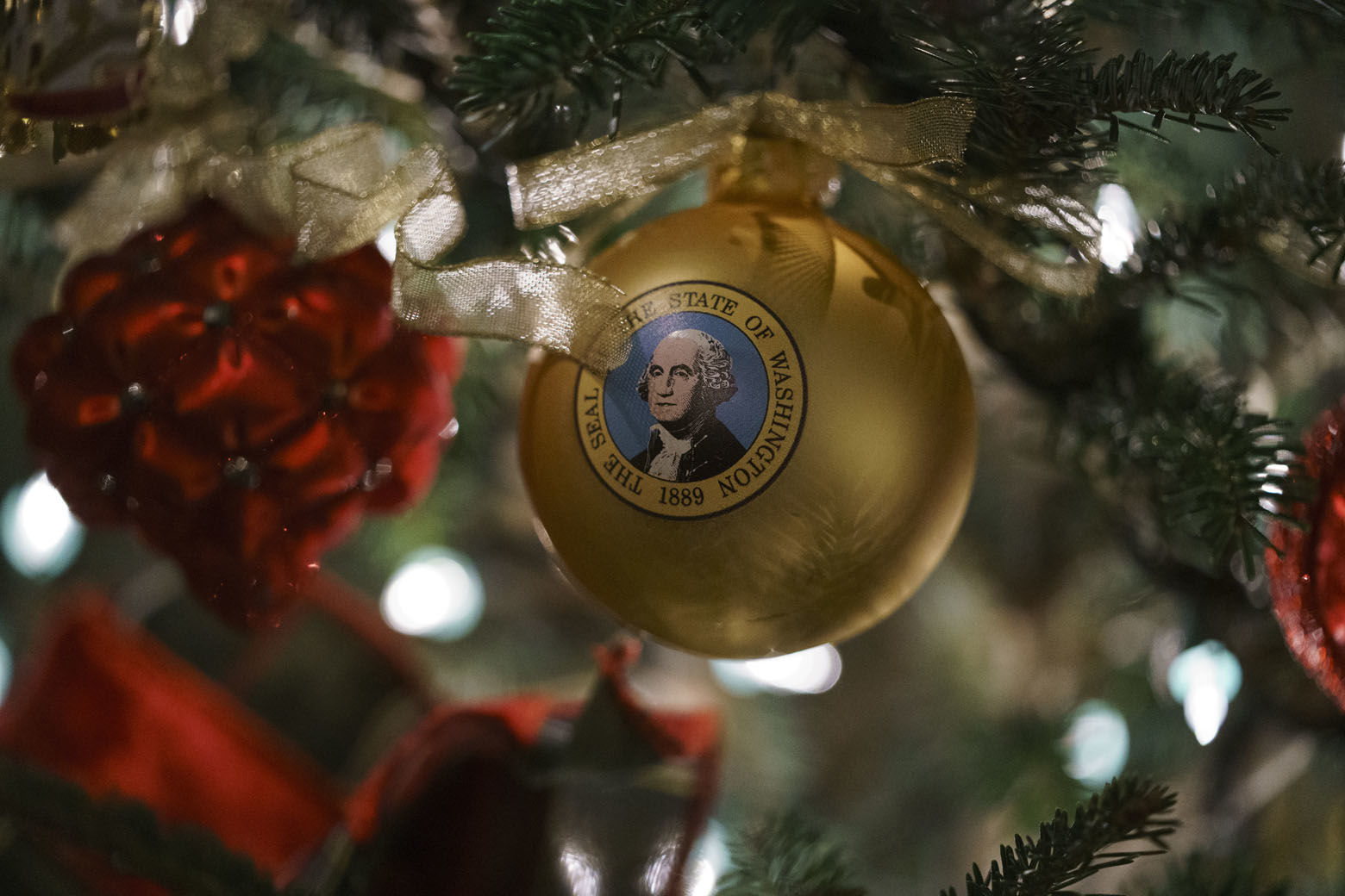 An ornament with an image of President George Washington is seen during the 2018 Christmas preview at the White House in Washington, Monday, Nov. 26, 2018. Christmas has arrived at the White House for 2018 as first lady Melania Trump unveiled the holiday decor. She designed the decor, which features a theme of "American Treasures." (AP Photo/Carolyn Kaster)