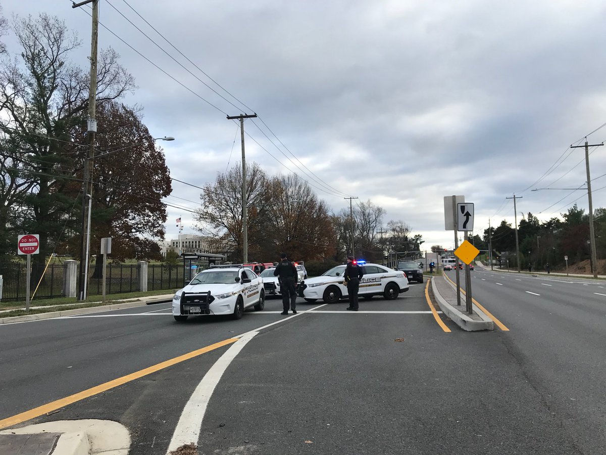 Montgomery County police block the entrance to Walter Reed National Military Medical Center amid reports of an active shooter. Officials later said the reports were a false alarm. (WTOP/Dick Uliano)