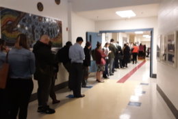 A line of voters wait in line at the poll at Bethesda Elementary in Montgomery County, Maryland. (WTOP/Lisa Weiner)