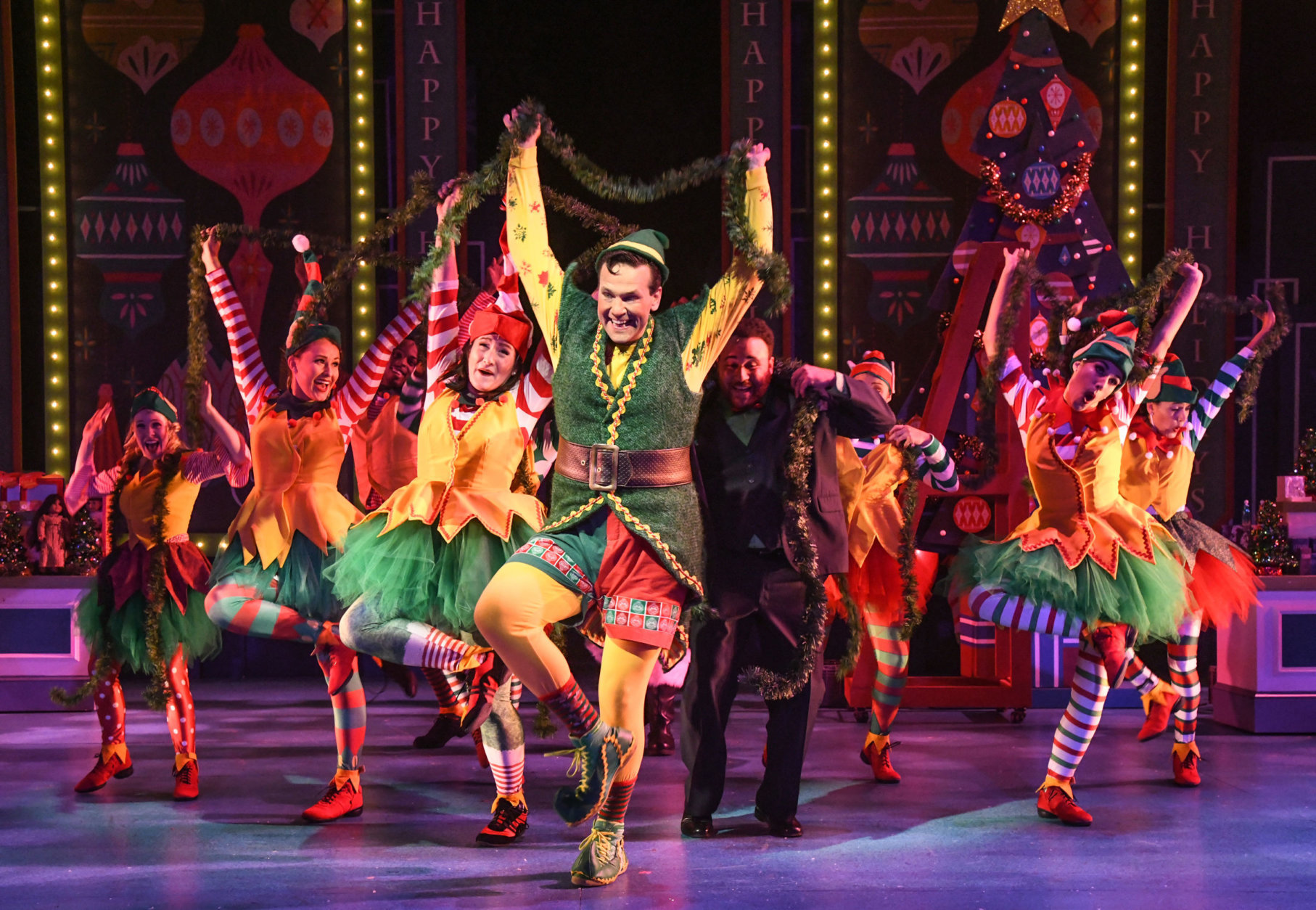 David Schlumpf as Buddy and the ensemble of "Elf: The Musical," at Olney Theatre Center. (Olney Theatre Center/Stan Barouh)