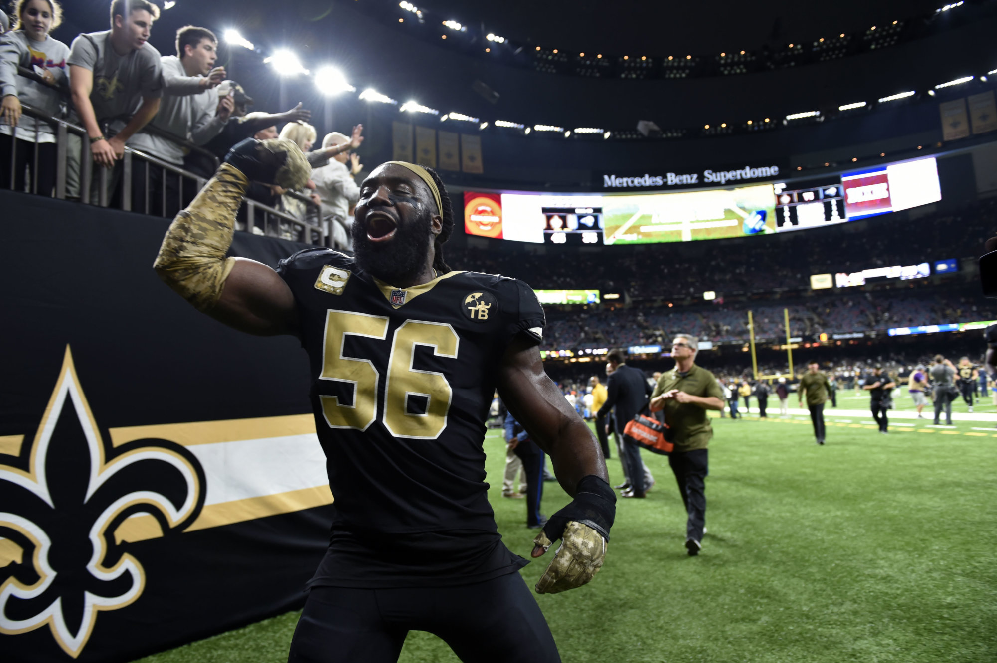 New Orleans Saints outside linebacker Demario Davis (56) celebrates after defeating the Los Angeles Rams in an NFL football game in New Orleans, Sunday, Nov. 4, 2018. The Saints won 45-35. (AP Photo/Bill Feig)