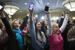 Supporters cheer as they watch returns at an election night party for Democrat congressional candidate Jennifer Wexton on Tuesday, Nov. 6, 2018, in Dulles, Va. (AP Photo/Alex Brandon)
