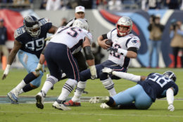 New England Patriots quarterback Tom Brady (12) is sacked by Tennessee Titans linebacker Harold Landry (58) for an 11-yard loss in the first half of an NFL football game Sunday, Nov. 11, 2018, in Nashville, Tenn. (AP Photo/Mark Zaleski)