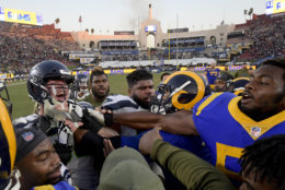 Seattle Seahawks center Justin Britt, left, and Los Angeles Rams defensive end Dante Fowler fight after an NFL football game Sunday, Nov. 11, 2018, in Los Angeles.the Rams won 31-36. (AP Photo/Mark J. Terrill)