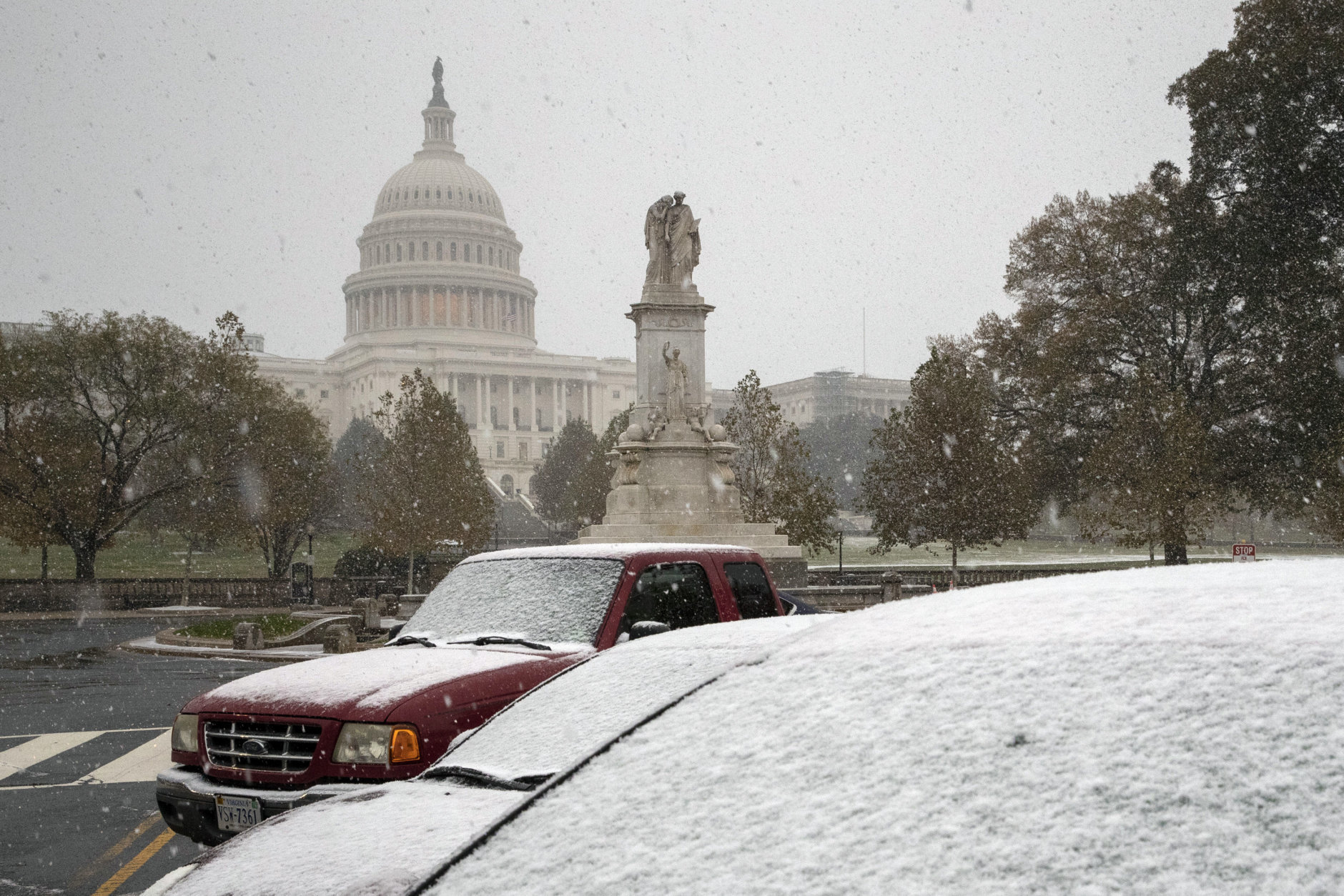 The first snow of the season falls on the Capitol in Washington, Thursday, Nov. 15, 2018. (AP Photo/J. Scott Applewhite)