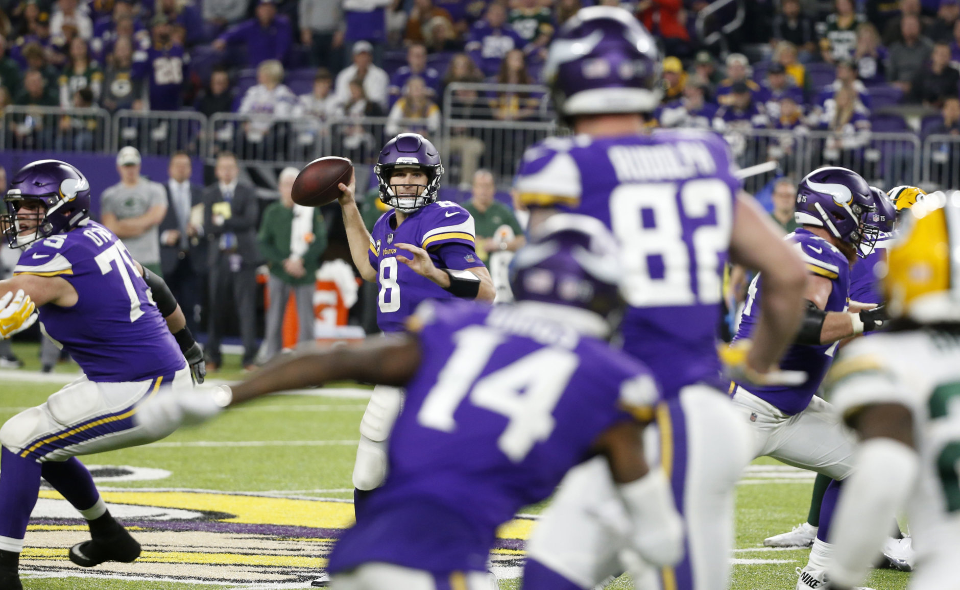 Minnesota Vikings quarterback Kirk Cousins (8) throws a pass during the second half of an NFL football game against the Green Bay Packers, Sunday, Nov. 25, 2018, in Minneapolis. The Vikings won 24-17. (AP Photo/Bruce Kluckhohn)