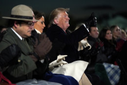 President Donald Trump and first lady Melania Trump attend the National Christmas Tree lighting ceremony on the Ellipse near the White House in Washington, Wednesday, Nov. 28, 2018. (AP Photo/Andrew Harnik)