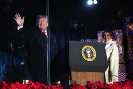 President Donald Trump and first lady Melania Trump wave during the National Christmas Tree lighting ceremony at the Ellipse near the White House in Washington, Wednesday, Nov. 28, 2018. (AP Photo/Andrew Harnik)