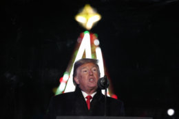 President Donald Trump speaks during the National Christmas Tree lighting ceremony at the Ellipse near the White House in Washington, Wednesday, Nov. 28, 2018. (AP Photo/Andrew Harnik)
