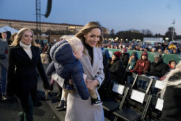 Lara Trump, the wife of Eric Trump carries her son Eric, as she and Tiffany Trump, the daughter of President Donald Trump, left, arrives for the National Christmas Tree lighting ceremony at the Ellipse near the White House in Washington, Wednesday, Nov. 28, 2018. (AP Photo/Andrew Harnik)
