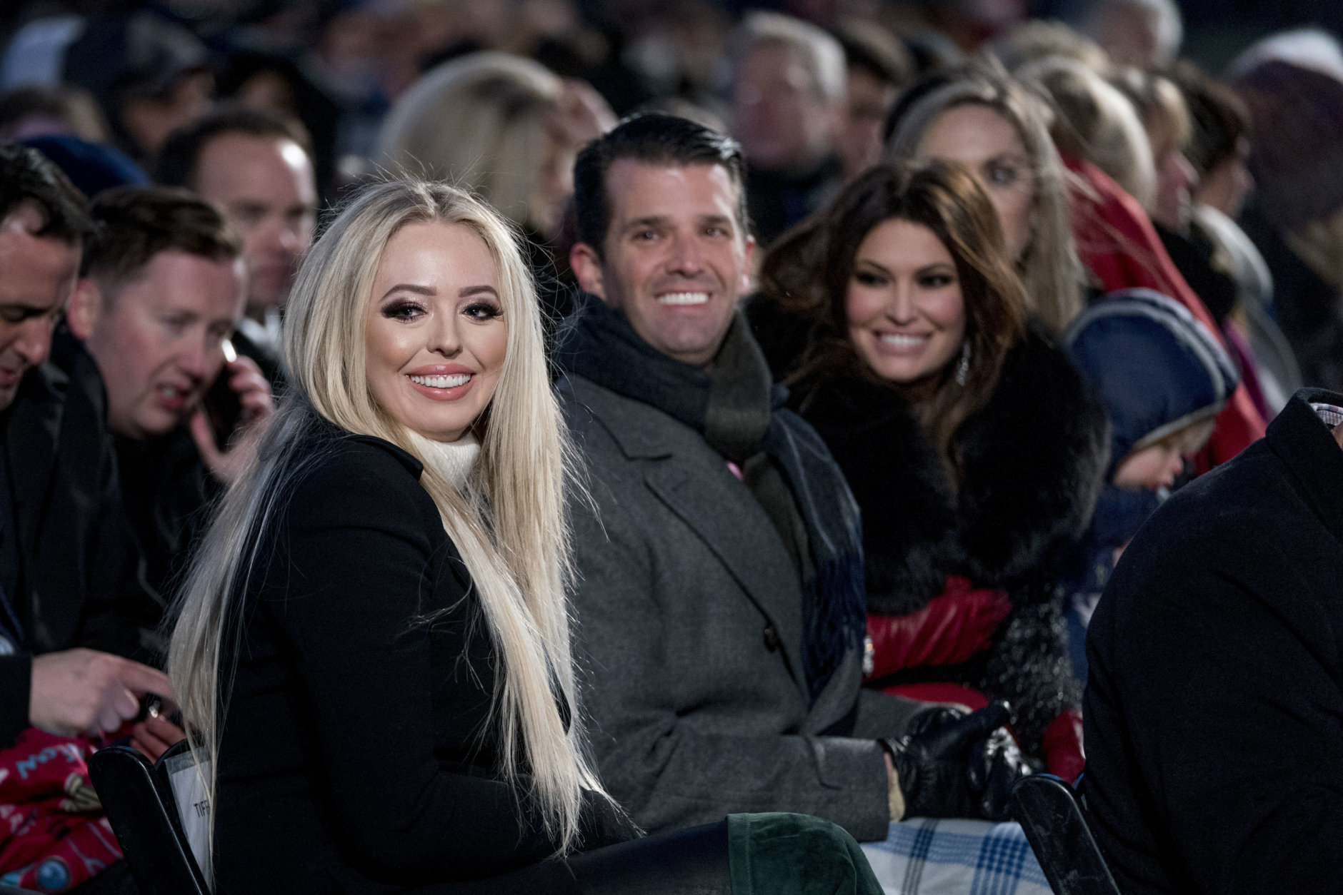 From left, Tiffany Trump, the daughter of President Donald Trump, Donald Trump Jr. and Kimberly Guilfoyle, arrive ahead of President Donald Trump and first lady Melania Trump at the National Christmas Tree lighting ceremony at the Ellipse near the White House in Washington, Wednesday, Nov. 28, 2018. (AP Photo/Andrew Harnik)