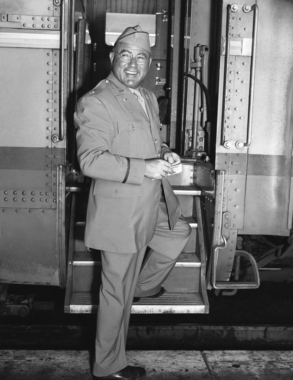 Major Hal Roach, noted motion picture producer, leaves Hollywood to take up his duties with the Signal Corps of the U.S. Army in Washington on July 29, 1942. Departure marks the first suspension of personal motion picture production for the first time since his entry into the business twenty seven years ago. During Roachs absence, his staff will carry on in production at the studio that bears his name. (AP Photo)