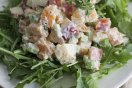 This July 21, 2014 photo shows butternut squash and apple Waldorf salad in Concord, N.H. The side dish can act as a compliment to a grilled main course for Labor Day. (AP Photo/Matthew Mead)